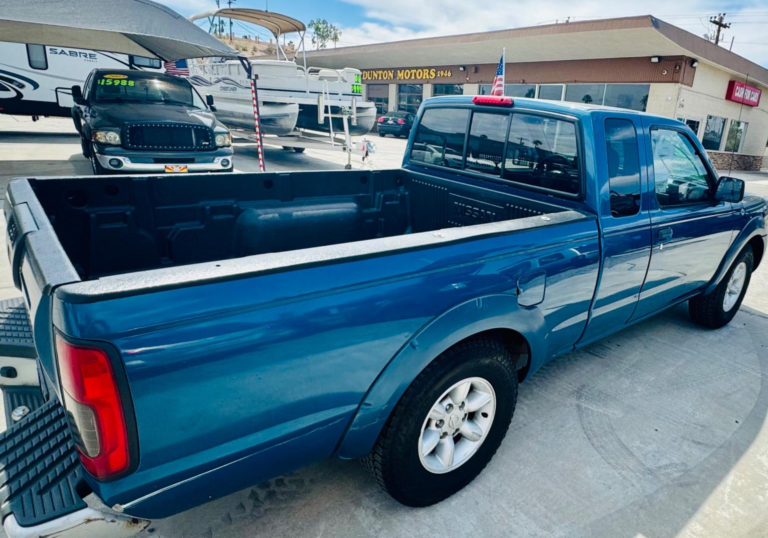 2001 Blue Nissan Frontier (1N6DD26S41C) , located at 2190 Hwy 95, Bullhead City, AZ, 86442, (928) 704-0060, 0.000000, 0.000000 - 2001 Nissan frontier xe king cab. 4 cylinder. 142k miles. Manual . Ice cold ac. Lots of extras done to truck . New tires new radiator. Fully serviced. New clutch, new brakes, pads. Runs and drives great. Financing available. In house financing .buy here pay here - Photo#2
